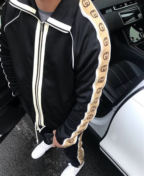 gucci track suit price.